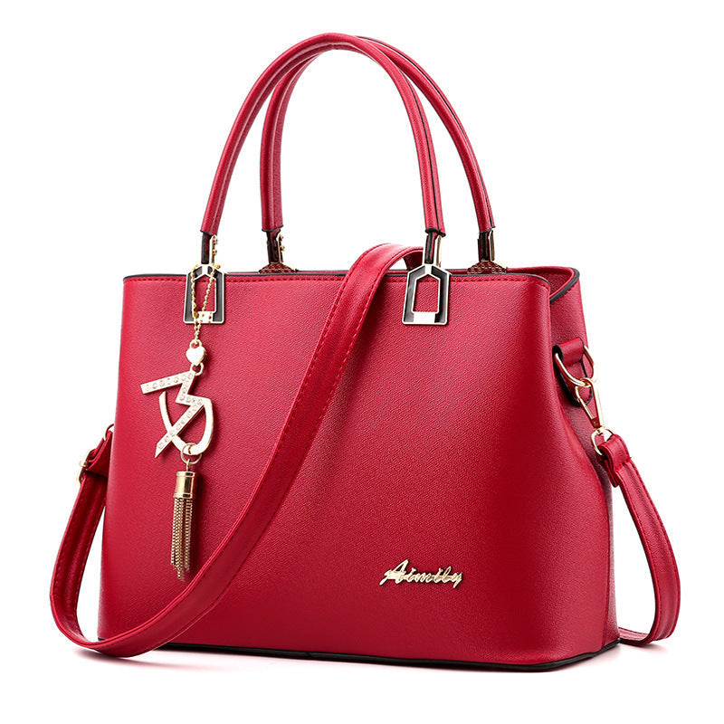 Ladies Elegant Handbag with Shoulder Strap and Luxury Pendant